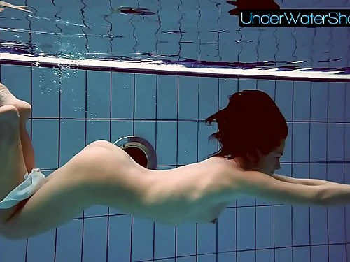 Wonderful adorable ultra-cutie Alla swims in the swimming pool